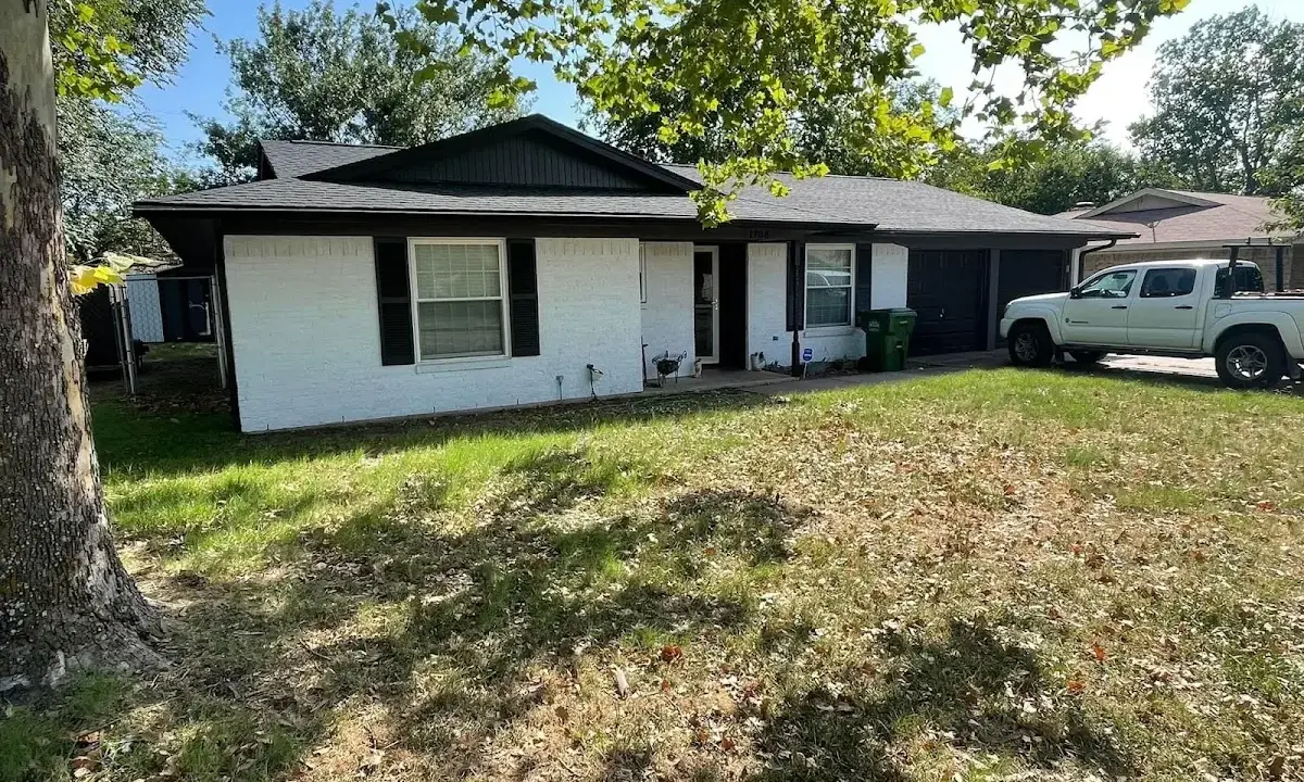 Professional roofing crew working on a residential roof in Hollywood